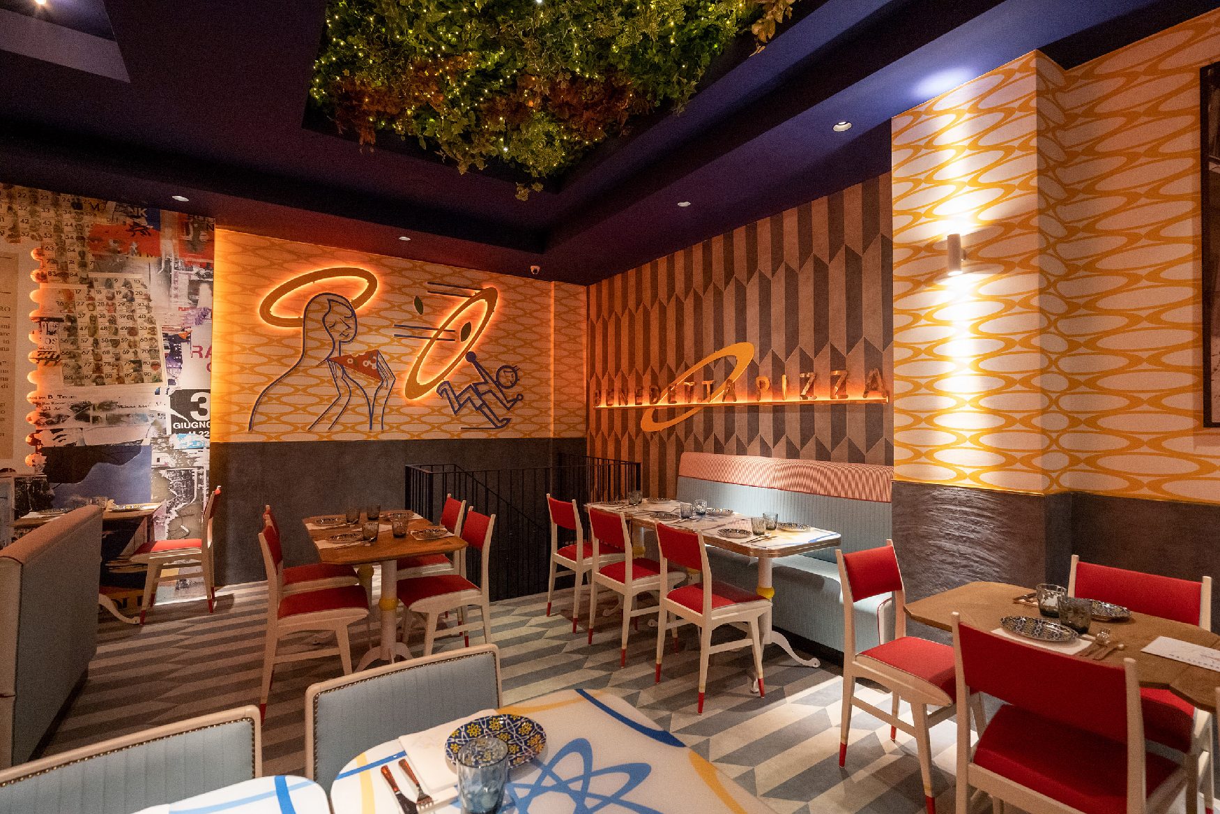 Dining room with illustrated wall
